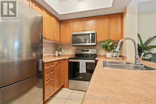 2066 - 3047 Finch Avenue W, Toronto, ON - Indoor Photo Showing Kitchen With Stainless Steel Kitchen With Double Sink