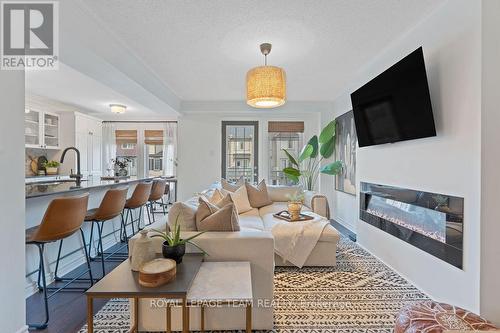 130 Grenadine Street, Ottawa, ON - Indoor Photo Showing Living Room With Fireplace