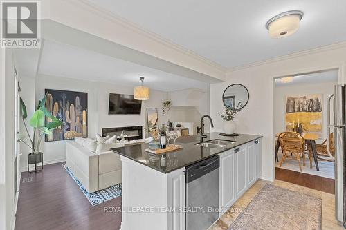 130 Grenadine Street, Ottawa, ON - Indoor Photo Showing Kitchen With Fireplace With Double Sink