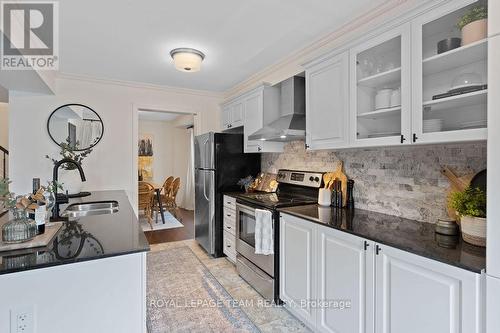 130 Grenadine Street, Ottawa, ON - Indoor Photo Showing Kitchen With Double Sink