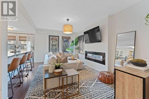 130 Grenadine Street, Ottawa, ON - Indoor Photo Showing Living Room With Fireplace