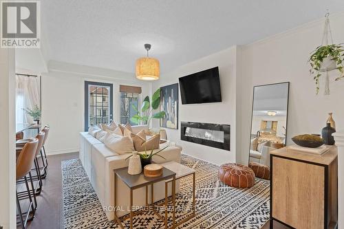 130 Grenadine Street, Ottawa, ON - Indoor Photo Showing Living Room With Fireplace