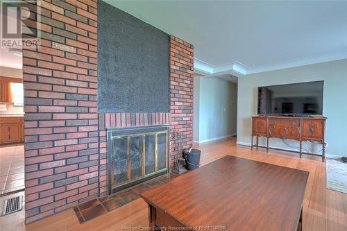 9630 Walker Road, Mcgregor, ON - Indoor Photo Showing Living Room With Fireplace