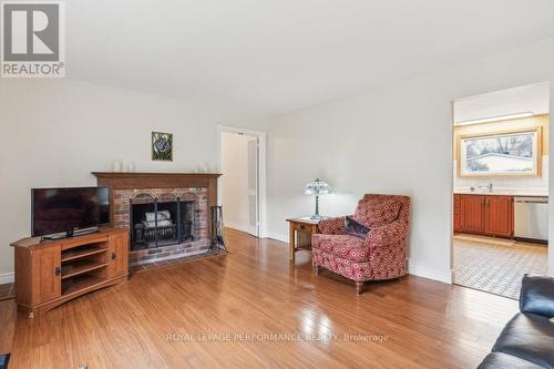 1932 Marquis Avenue, Ottawa, ON - Indoor Photo Showing Living Room With Fireplace