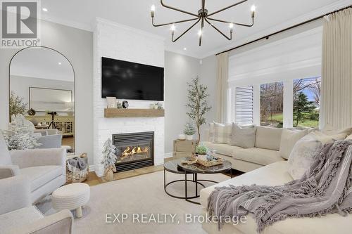 6654 Stillwood Drive, Ottawa, ON - Indoor Photo Showing Living Room With Fireplace