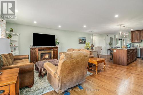 15 Wintonia Drive, North Dundas, ON - Indoor Photo Showing Living Room With Fireplace