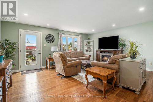 15 Wintonia Drive, North Dundas, ON - Indoor Photo Showing Living Room With Fireplace