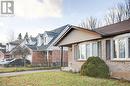 View of front of property with a front lawn - 220 Bankside Drive, Kitchener, ON  - Outdoor 