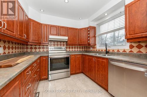 904 Smyth Road, Ottawa, ON - Indoor Photo Showing Kitchen With Double Sink