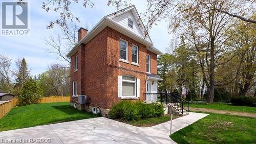 View of home's exterior with a lawn - 550 10Th Street A West, Owen Sound, ON - Outdoor