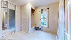 Mudroom featuring light carpet - 