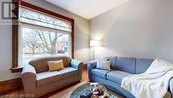 Living room featuring wood-type flooring - 