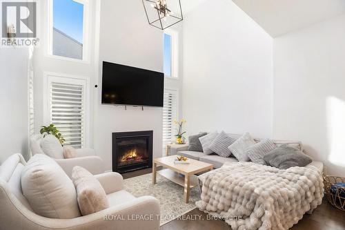 284 Dolce Crescent, Ottawa, ON - Indoor Photo Showing Living Room With Fireplace