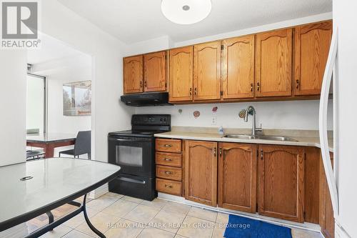 210 - 900 Dynes Road, Ottawa, ON - Indoor Photo Showing Kitchen With Double Sink