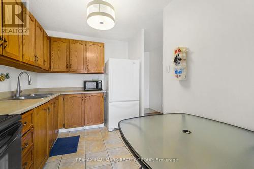 210 - 900 Dynes Road, Ottawa, ON - Indoor Photo Showing Kitchen With Double Sink