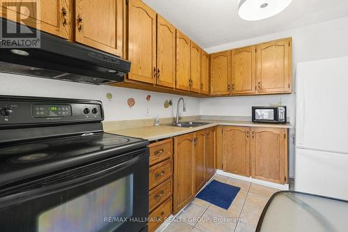 210 - 900 Dynes Road, Ottawa, ON - Indoor Photo Showing Kitchen With Double Sink