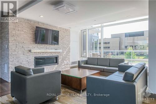 102 - 530 De Mazenod Avenue, Ottawa, ON - Indoor Photo Showing Living Room With Fireplace