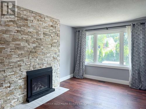 C - 2969 Richmond Road, Ottawa, ON - Indoor Photo Showing Living Room With Fireplace