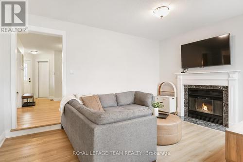 34 Bridle Park Drive, Ottawa, ON - Indoor Photo Showing Living Room With Fireplace