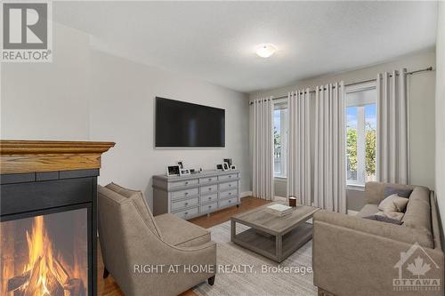 257 Via San Marino Street W, Ottawa, ON - Indoor Photo Showing Living Room With Fireplace