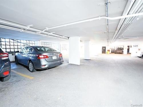 Garage - 909-2555 Av. Du Havre-Des-Îles, Laval (Chomedey), QC - Indoor Photo Showing Garage