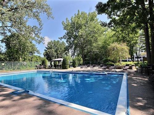 Piscine - 909-2555 Av. Du Havre-Des-Îles, Laval (Chomedey), QC - Outdoor With In Ground Pool