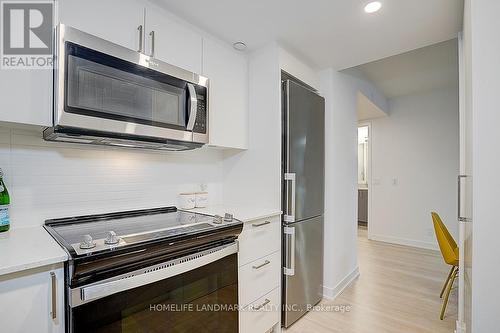 335 - 30 Tretti Way, Toronto, ON - Indoor Photo Showing Kitchen