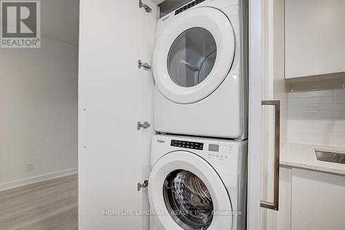 335 - 30 Tretti Way, Toronto, ON - Indoor Photo Showing Laundry Room