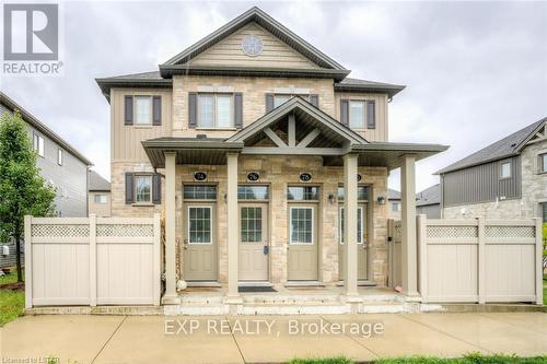 76 - 3200 Singleton Avenue, London, ON - Outdoor With Facade