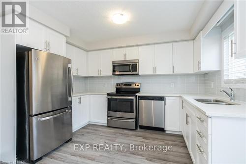 76 - 3200 Singleton Avenue, London, ON - Indoor Photo Showing Kitchen With Stainless Steel Kitchen With Double Sink