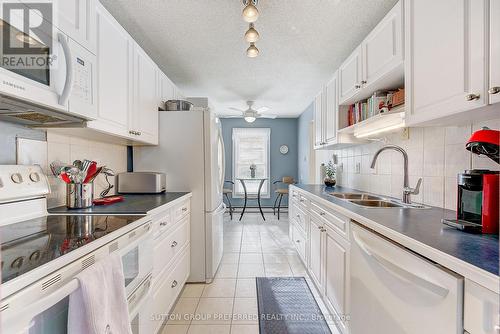 516 Cranbrook Road, London, ON - Indoor Photo Showing Kitchen With Double Sink