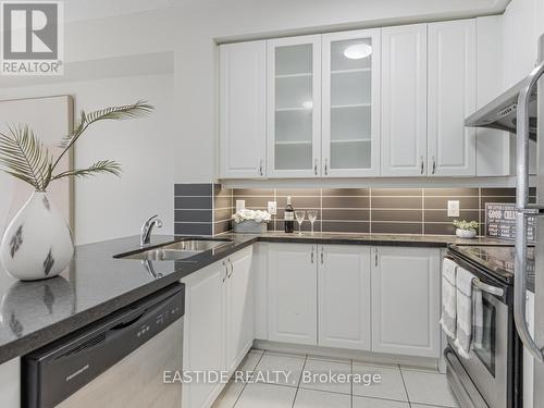 607 - 131 Upper Duke Crescent, Markham, ON - Indoor Photo Showing Kitchen With Double Sink With Upgraded Kitchen