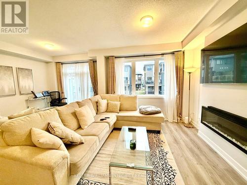 237 Anyolite Private N, Ottawa, ON - Indoor Photo Showing Living Room With Fireplace