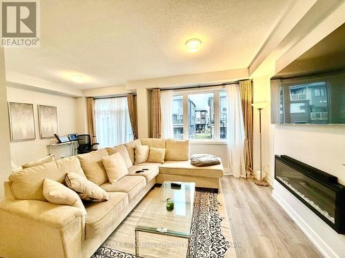 237 Anyolite Private N, Ottawa, ON - Indoor Photo Showing Living Room With Fireplace