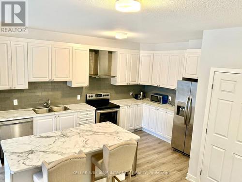 237 Anyolite Private N, Ottawa, ON - Indoor Photo Showing Kitchen With Double Sink