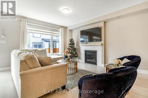 829 Sendero Way, Ottawa, ON - Indoor Photo Showing Living Room With Fireplace