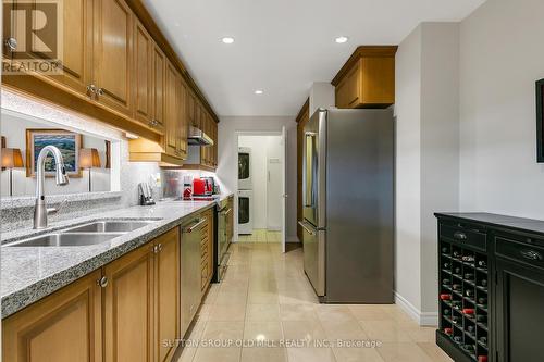 713 - 2662 Bloor Street W, Toronto, ON - Indoor Photo Showing Kitchen With Double Sink