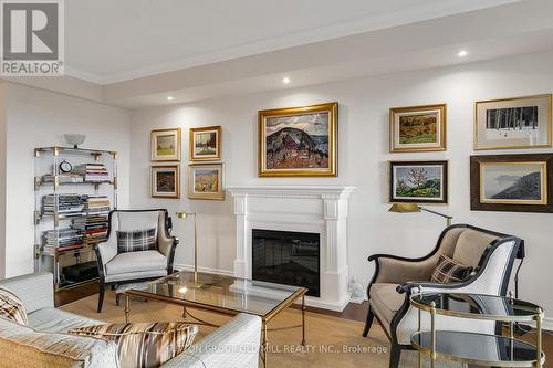 713 - 2662 Bloor Street W, Toronto, ON - Indoor Photo Showing Living Room With Fireplace