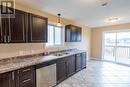 2240 Pitt Street W, Stormont, Dundas And Glengarry, ON  - Indoor Photo Showing Kitchen With Double Sink 