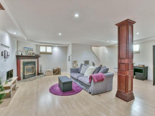 Salle familiale - 1272 Rue Des Chênes, Prévost, QC - Indoor Photo Showing Other Room With Fireplace