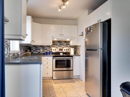 Cuisine - 112 Rue Des Pruches, Vaudreuil-Dorion, QC - Indoor Photo Showing Kitchen With Double Sink