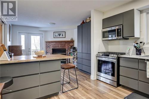 79 Lady Ashley Court, Sudbury, ON - Indoor Photo Showing Kitchen With Fireplace