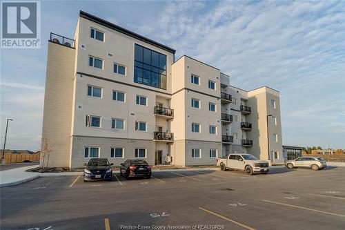 1900 6Th Concession Unit# 302, Lasalle, ON - Outdoor With Balcony With Facade