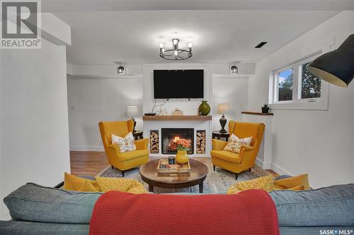 134 Silverwood Road, Saskatoon, SK - Indoor Photo Showing Living Room With Fireplace