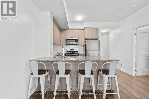 408 - 65 Yorkland Boulevard, Brampton, ON - Indoor Photo Showing Kitchen