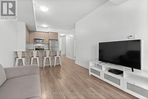 408 - 65 Yorkland Boulevard, Brampton, ON - Indoor Photo Showing Living Room