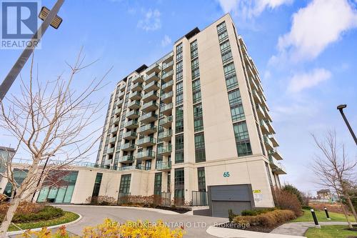 408 - 65 Yorkland Boulevard, Brampton, ON - Outdoor With Balcony With Facade