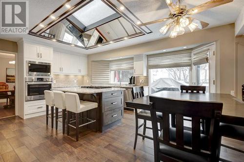 Kitchen and Breakfast Nook - 14136 Park Estates Drive Se, Calgary, AB 