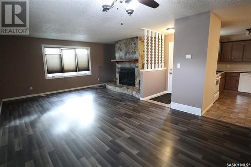 278 Trifunov Crescent, Regina, SK - Indoor Photo Showing Living Room With Fireplace