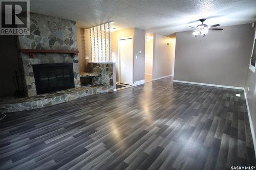 278 Trifunov Crescent, Regina, SK - Indoor Photo Showing Living Room With Fireplace